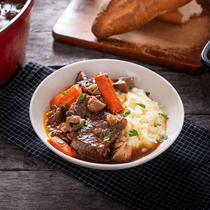 Borrego Assado com Puré de Batata com Cenoura e Couve